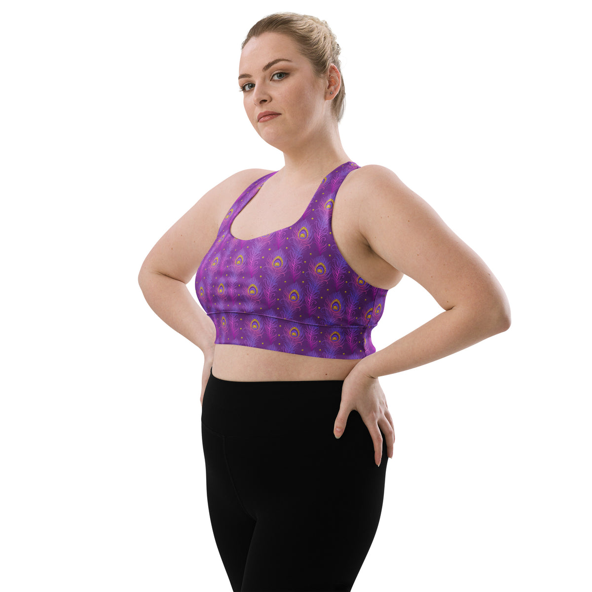 Purple longline sports bra with peacock-feather print, wide underband, scoop neckline