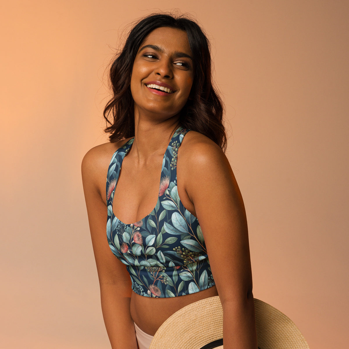 Teal botanical print longline sports bra with racerback and smooth wide underband