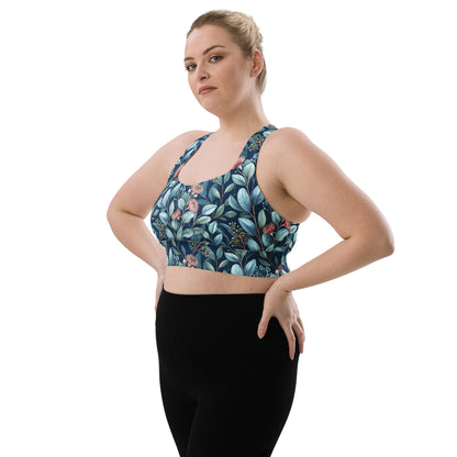 Longline sports bra with teal leaf and flower print, racerback and wide hem