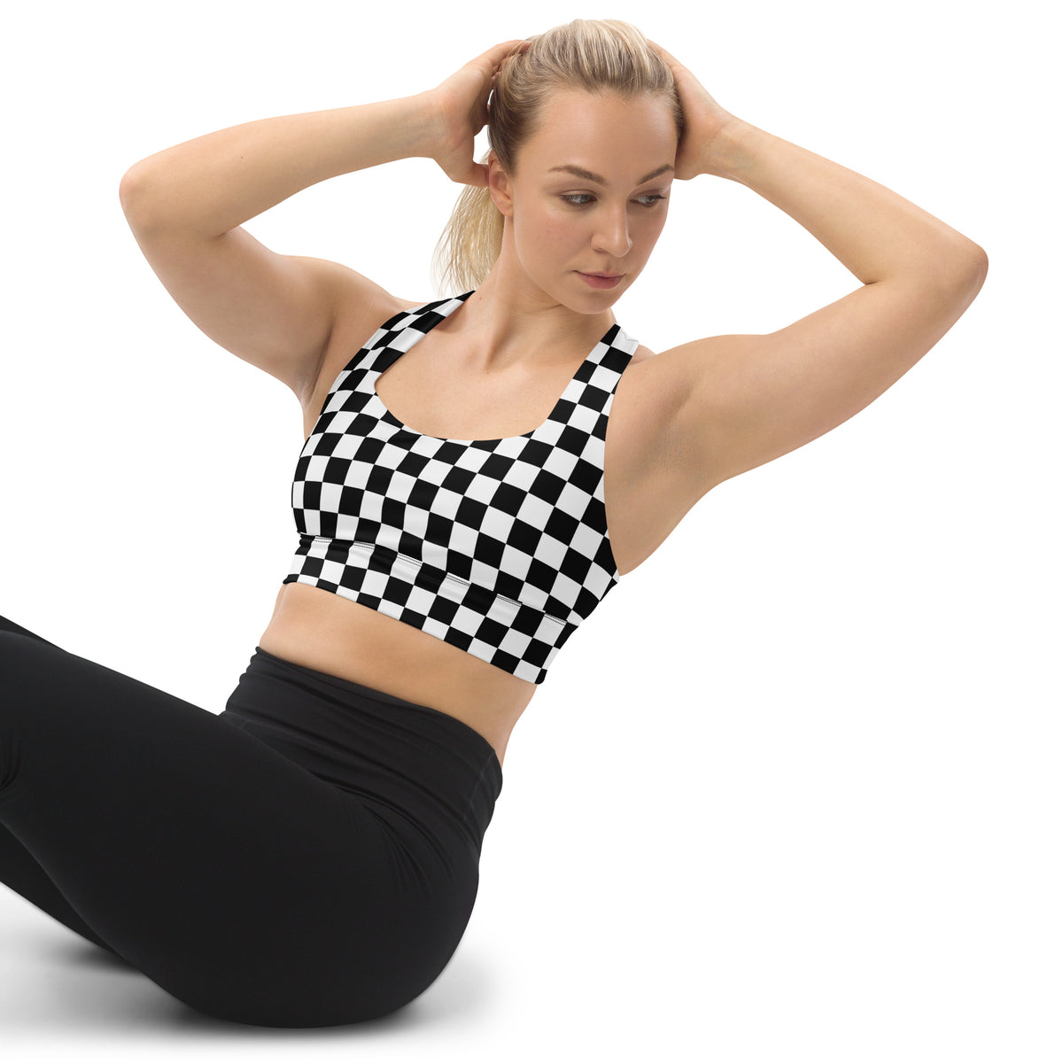 Black-and-white checkered sports bra with square neckline and racerback straps