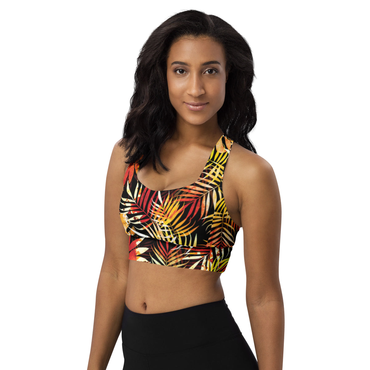 Longline sports bra with tropical leaf print, supportive scoop neckline and wide band