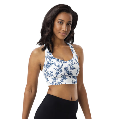 Blue floral longline sports bra with scoop neckline and supportive racerback