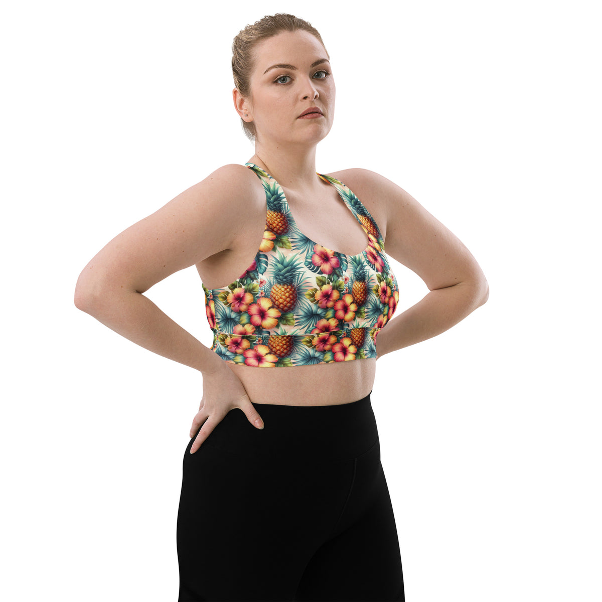 Teal pineapple and hibiscus print longline sports bra with wide straps and scoop front