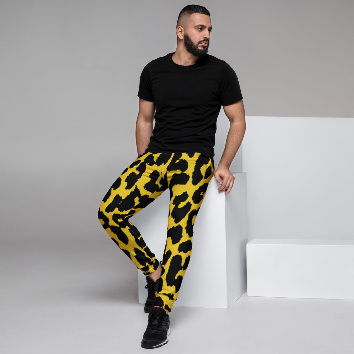 Men's leopard print joggers, yellow and black, tapered legs with elastic cuff hems