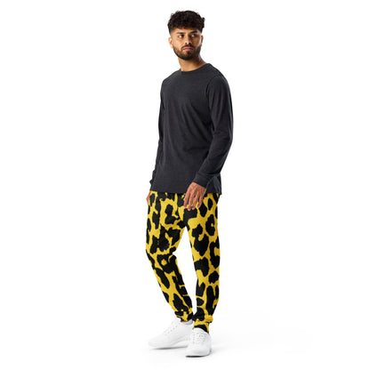 Leopard print joggers in yellow and black, tapered fit with elastic waistband
