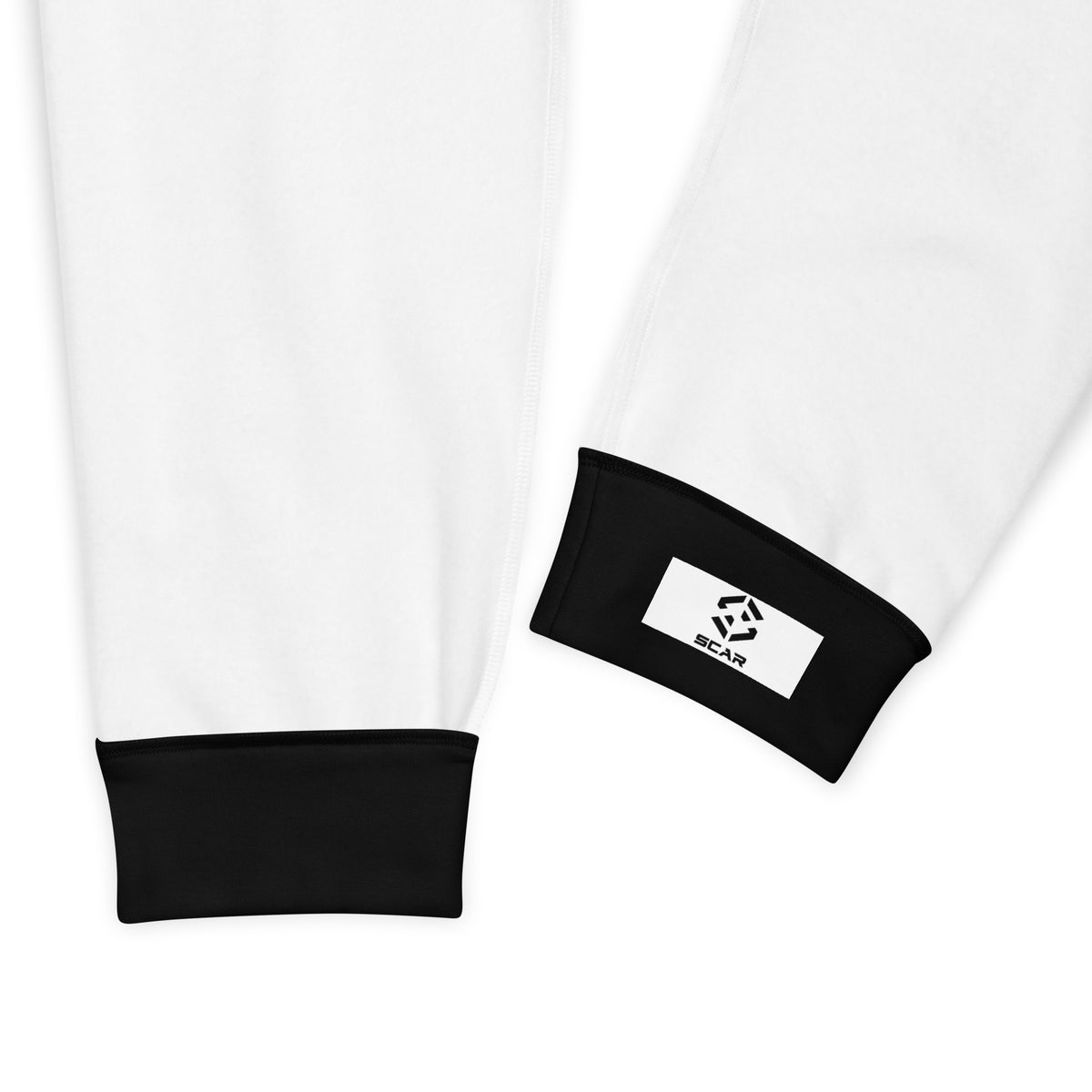 Black jogger cuff with small white logo label and elastic hem
