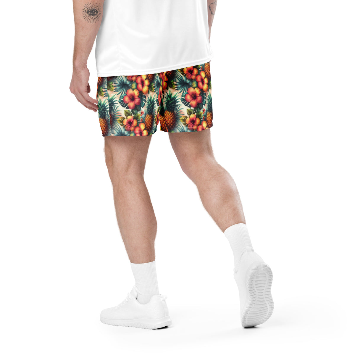 Unisex mesh shorts with tropical pineapple and hibiscus print, side view