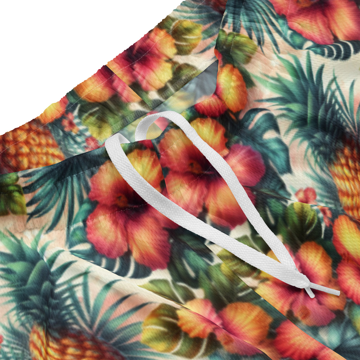 Tropical print shorts with white drawstring on the waistband, pineapple and floral pattern