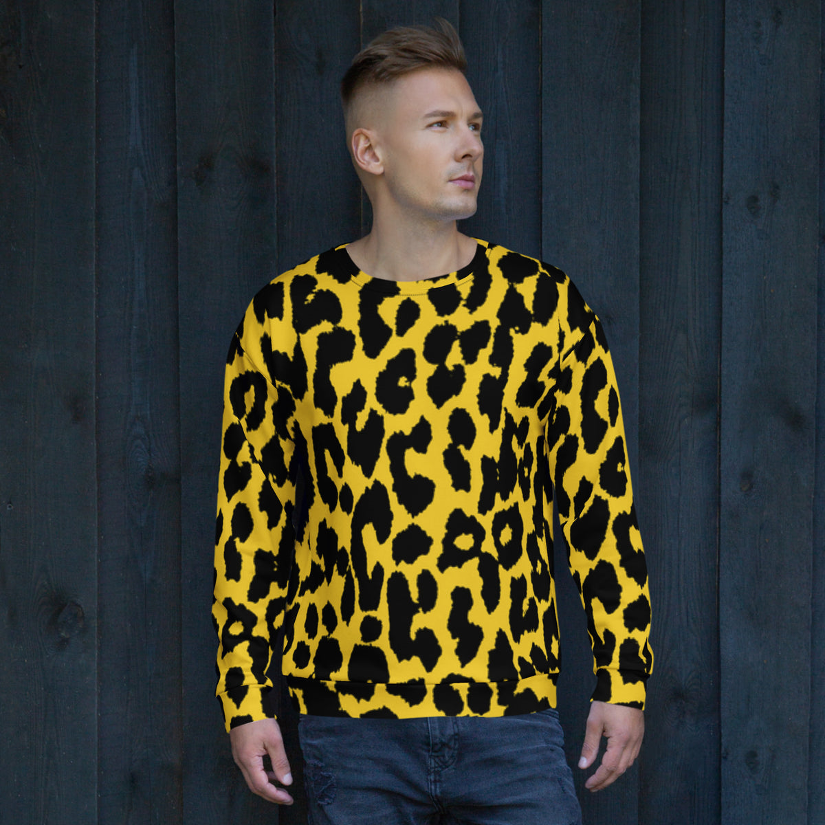 Leopard print sweatshirt worn by a man, yellow with dark spots, long sleeves and crew neck