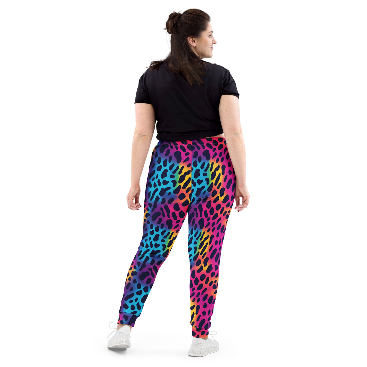 Women’s joggers in rainbow leopard print, elastic waistband, tapered leg openings.
