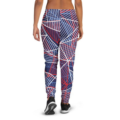 Women’s performance jogger pants with abstract blue, red, and white line graphic.