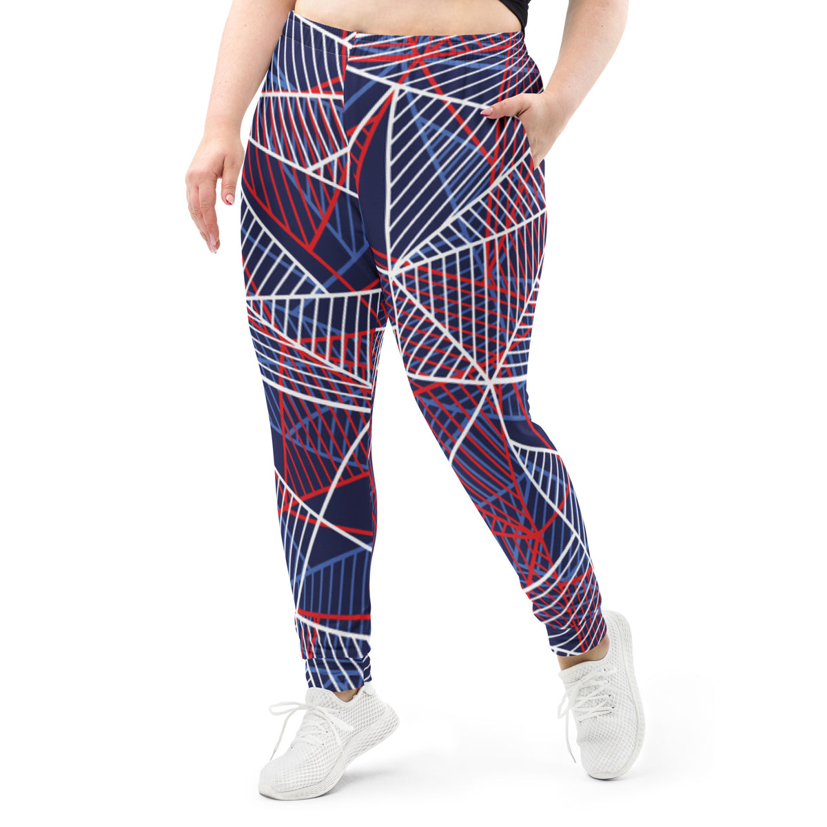 Women’s abstract line joggers showing side seam detail in navy with red and white lines.