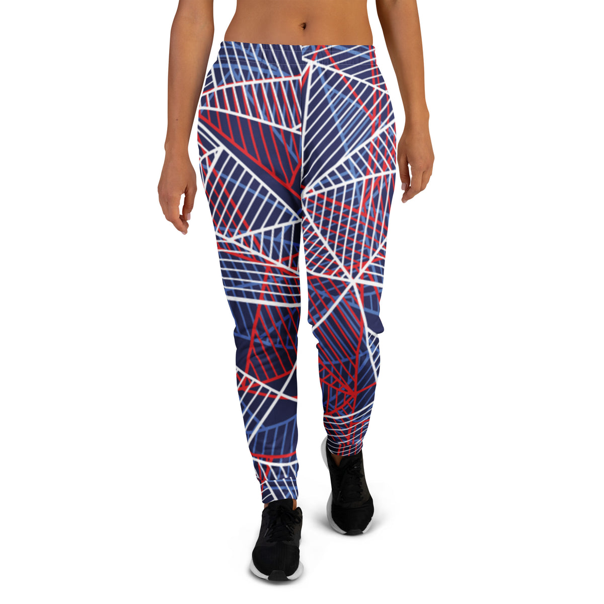 Women’s jogger pants with abstract line print in navy, red, and white.