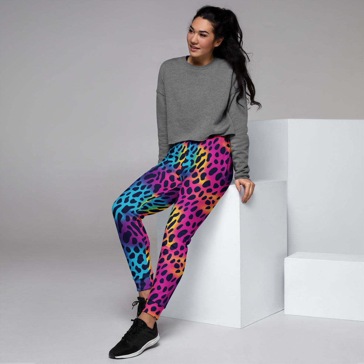 Women’s leopard print joggers in rainbow colors, tapered fit with elastic waistband.