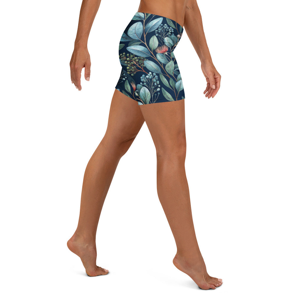 Botanic Garden shorts on model, teal botanical print with mid-rise waistband