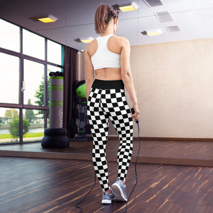 Checkered yoga leggings with high-rise black waistband and bold square pattern