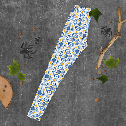 Leggings with blue and white Moroccan tile floral pattern, full-length.