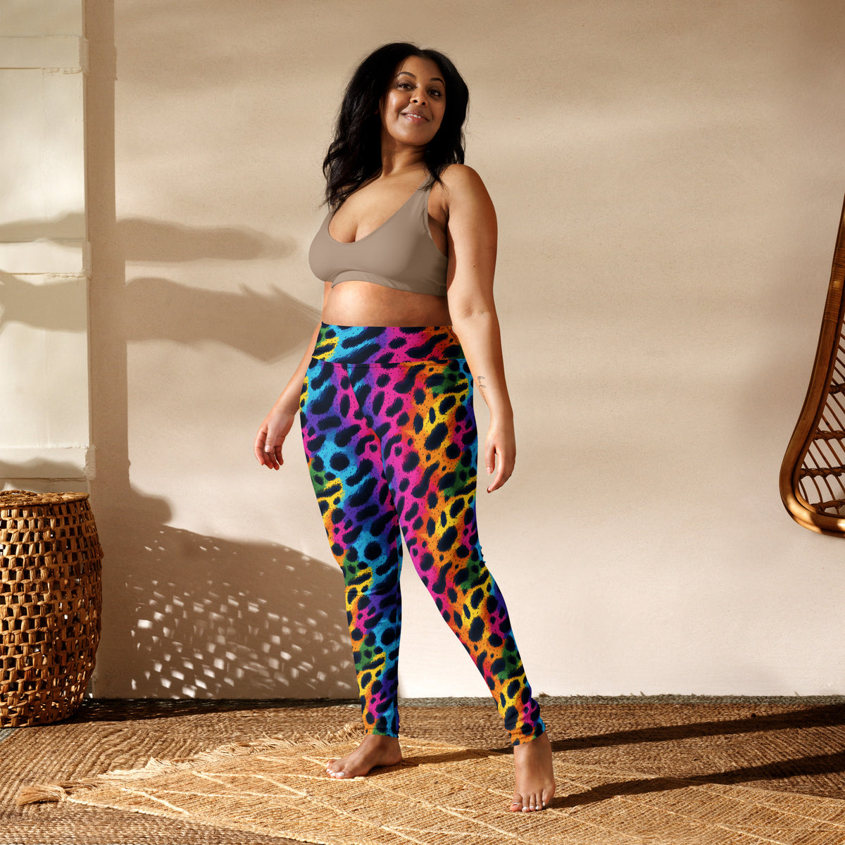 Rainbow leopard print yoga leggings on model, full-length with slim leg fit.