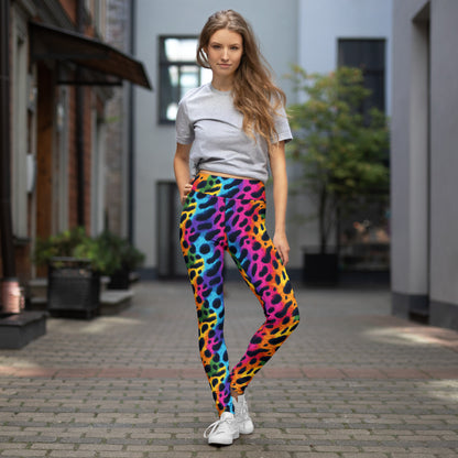 Rainbow leopard print yoga leggings on model walking, full-length slim fit.