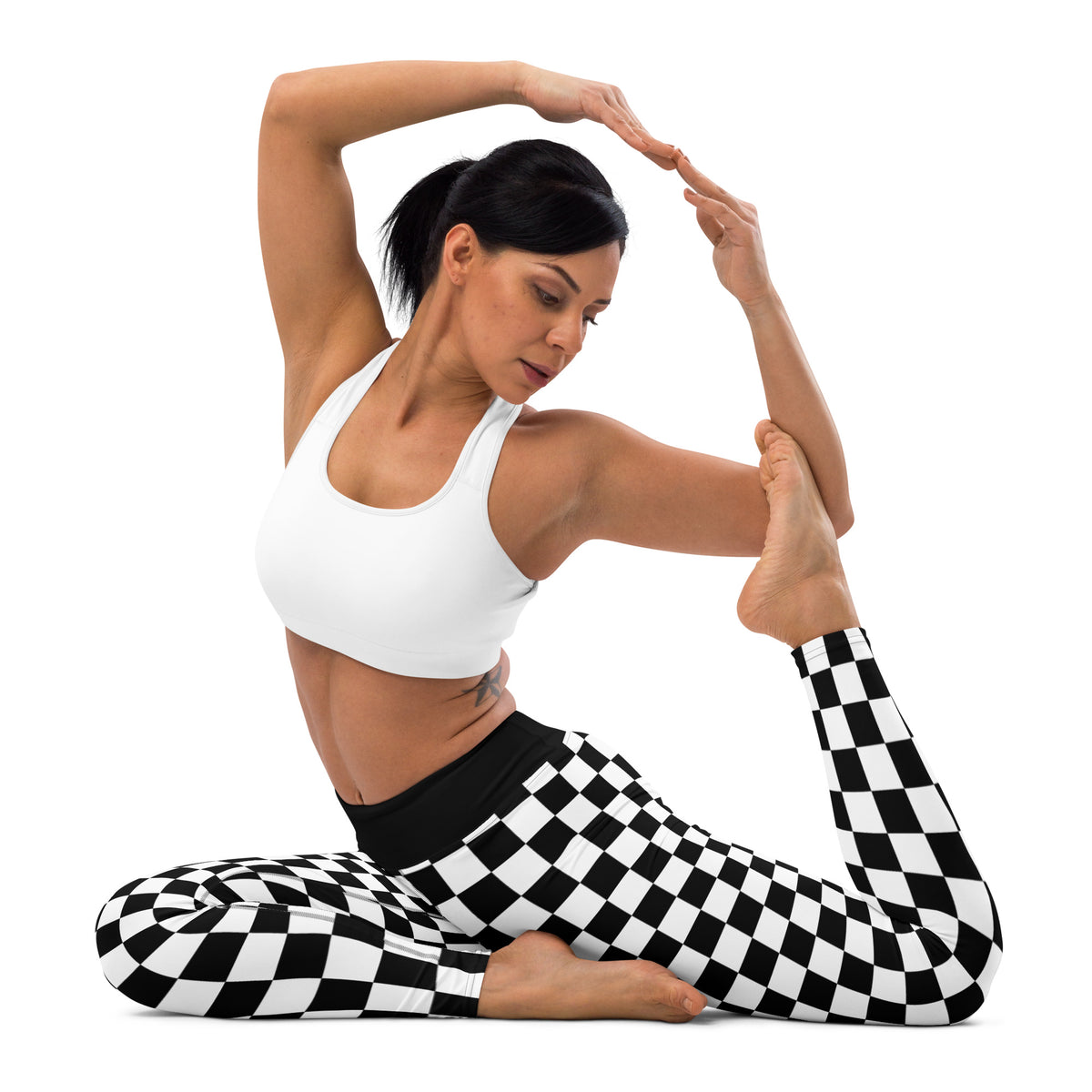 Black-and-white checkered yoga leggings with high-rise waistband and fitted legs