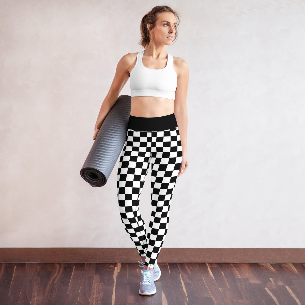 Black-and-white checkered yoga leggings with high-rise waistband and skinny straight cut
