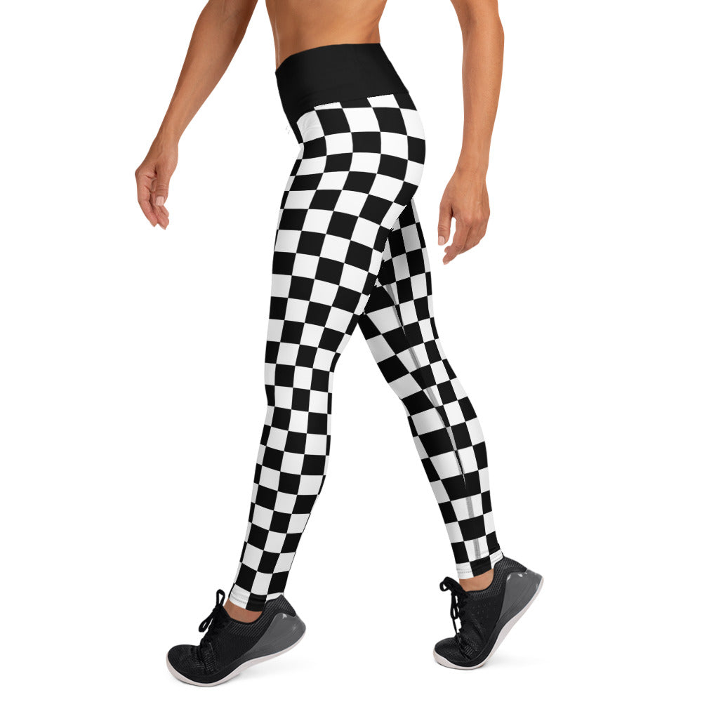 Black-and-white checkered yoga leggings with full-length slim legs, side view