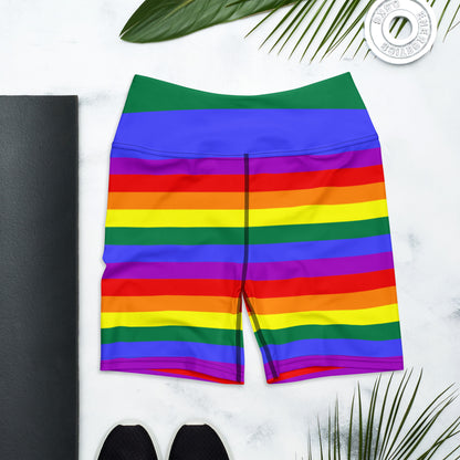 Rainbow striped yoga shorts with green waistband, folded flat lay