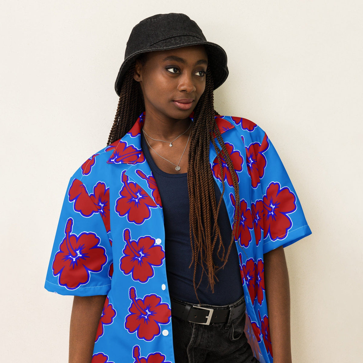 Blue Hawaiian floral shirt with red hibiscus pattern, open collar and button-front detail.