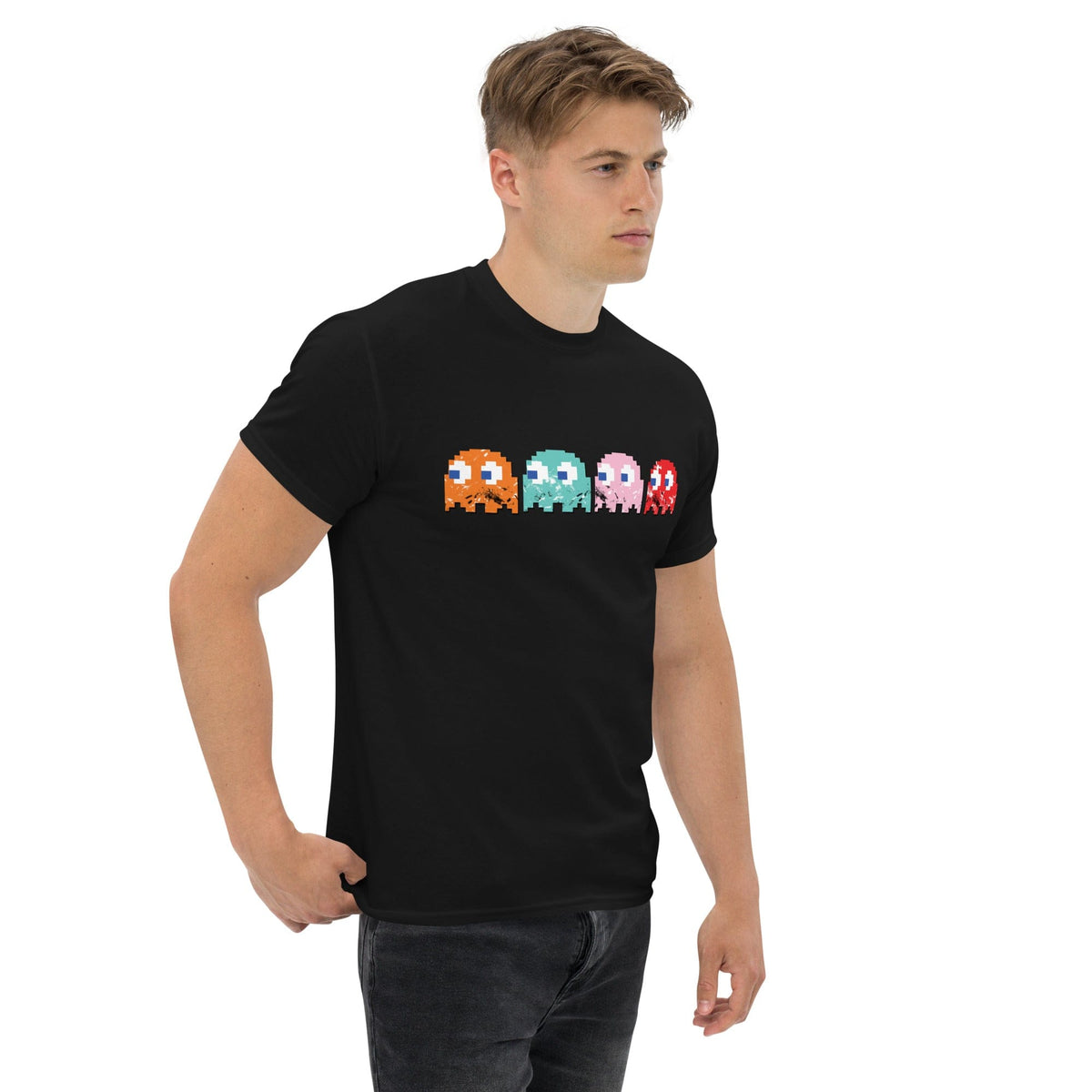 Black T-shirt with pixel-style arcade characters graphic on chest, short sleeves.