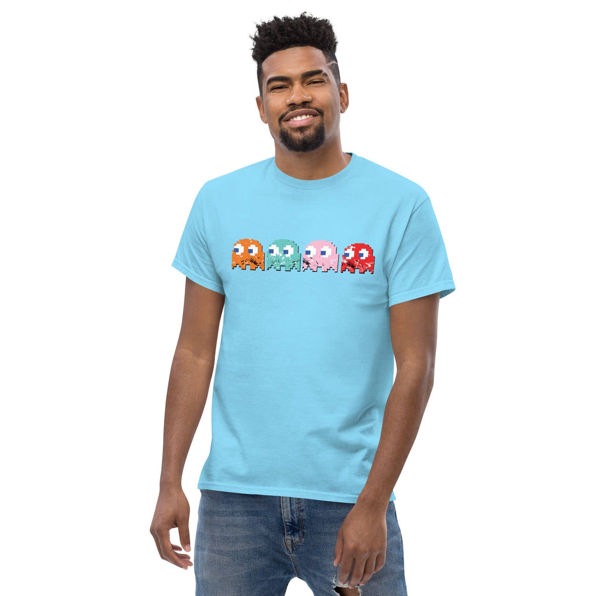 Light blue T-shirt with pixel-style arcade characters graphic across the chest.