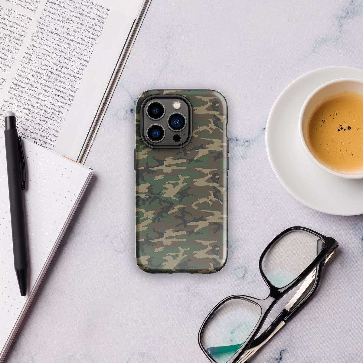 Camouflage rugged phone case with raised camera ring around triple lenses