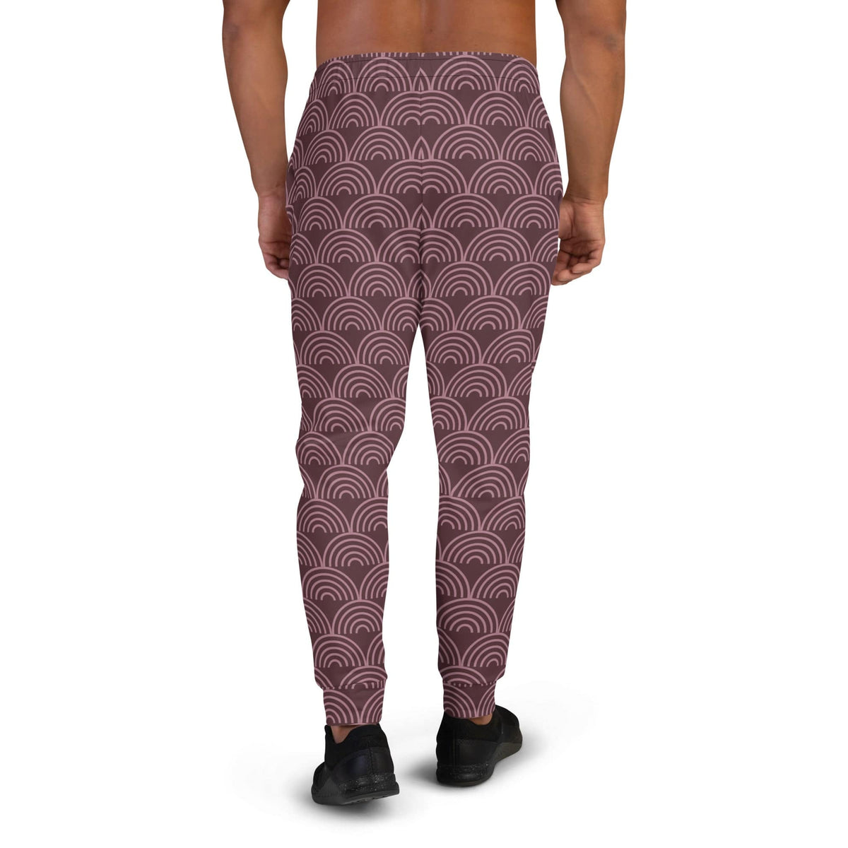 Men's joggers with maroon and dark semicircle wave pattern on the back view.