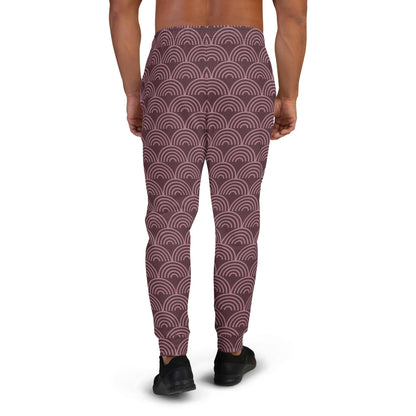 Men's joggers with maroon and dark semicircle wave pattern on the back view.
