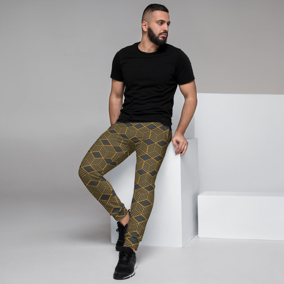 Men's joggers with cube geometric print, dark base, gold lines, slim tapered fit