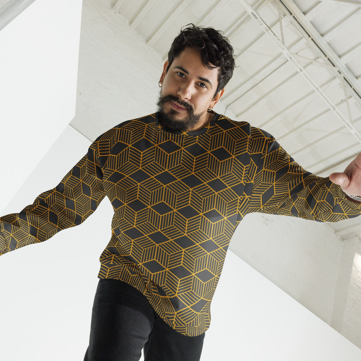 Unisex crewneck sweatshirt with gold cube geometric pattern on dark fabric, long sleeves