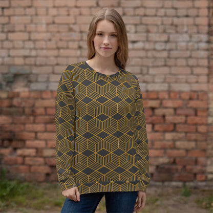 Unisex crewneck sweatshirt on model, dark base with gold cube geometric pattern, long sleeves