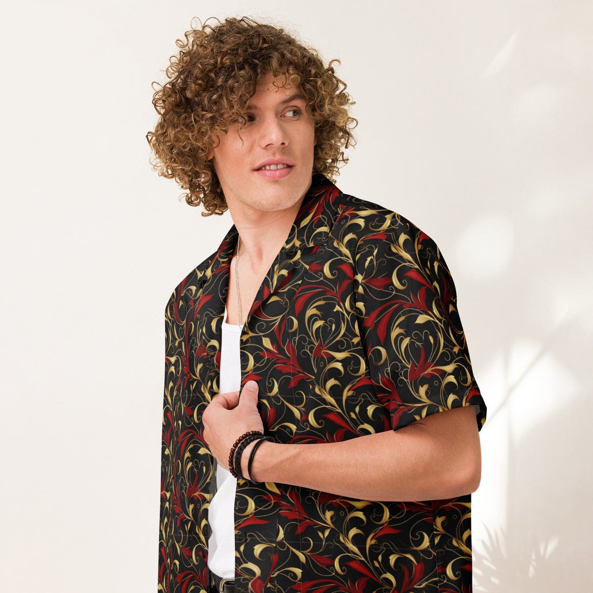 Baroque art short-sleeve button shirt with dark navy base and red/gold swirl floral pattern.