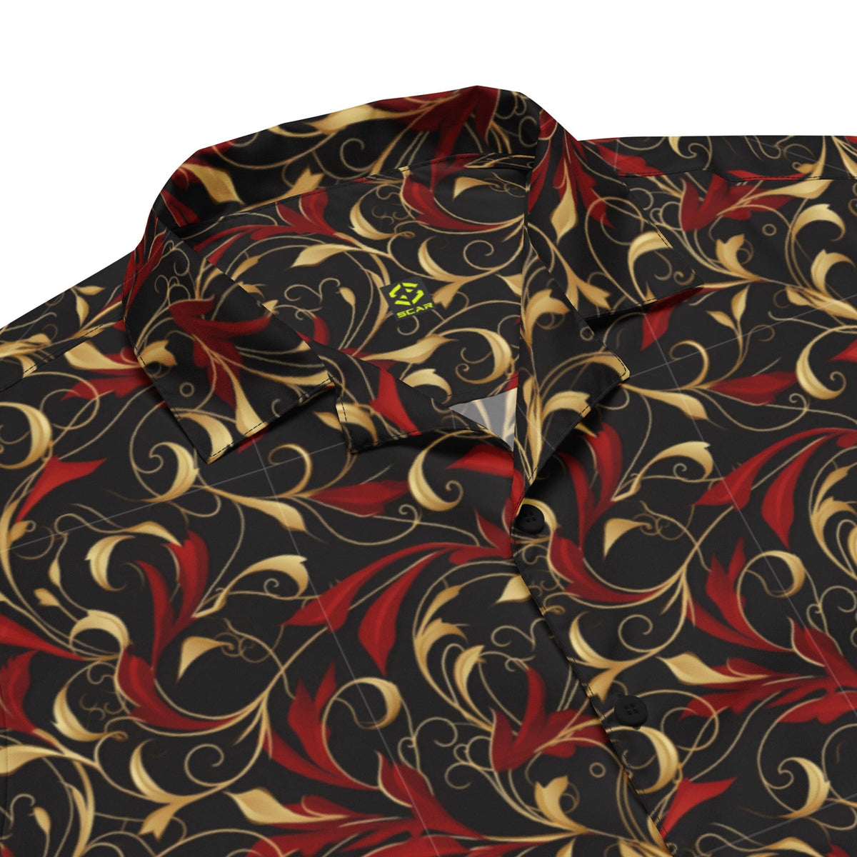 Close-up baroque art fabric: dark navy with red and gold swirling floral print.