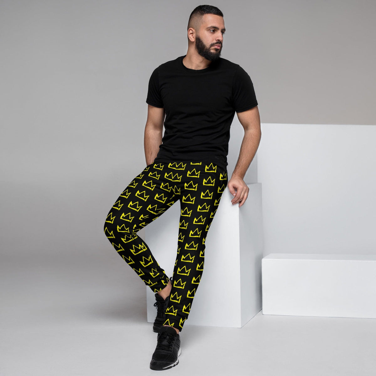Men's joggers black with yellow crown pattern, elastic waistband, tapered legs