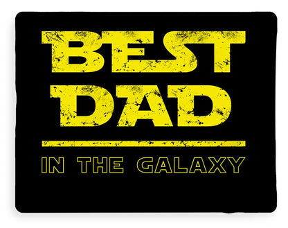 Black blanket with distressed yellow “BEST DAD” text and “IN THE GALAXY” line