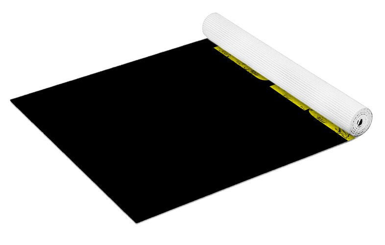 Yoga mat, black sheet with yellow trim and rolled white edge