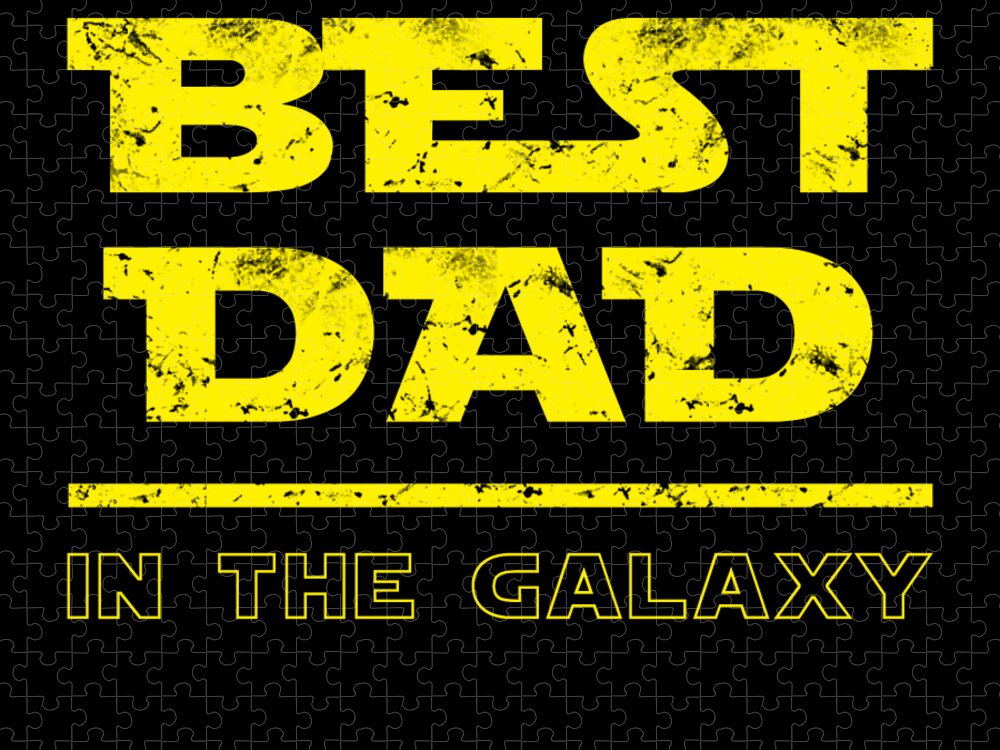 Puzzle with yellow 'Best Dad' text and 'In the Galaxy' line on a dark jigsaw background