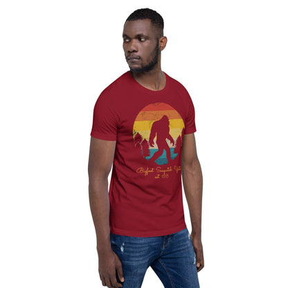 Cardinal red Bigfoot Yeti T-shirt with Bigfoot silhouette sunset circle graphic, crew neck