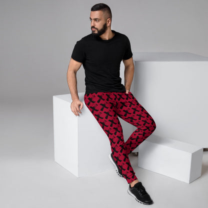 Men's red joggers with black X pattern, slim fit and elastic ankle cuffs