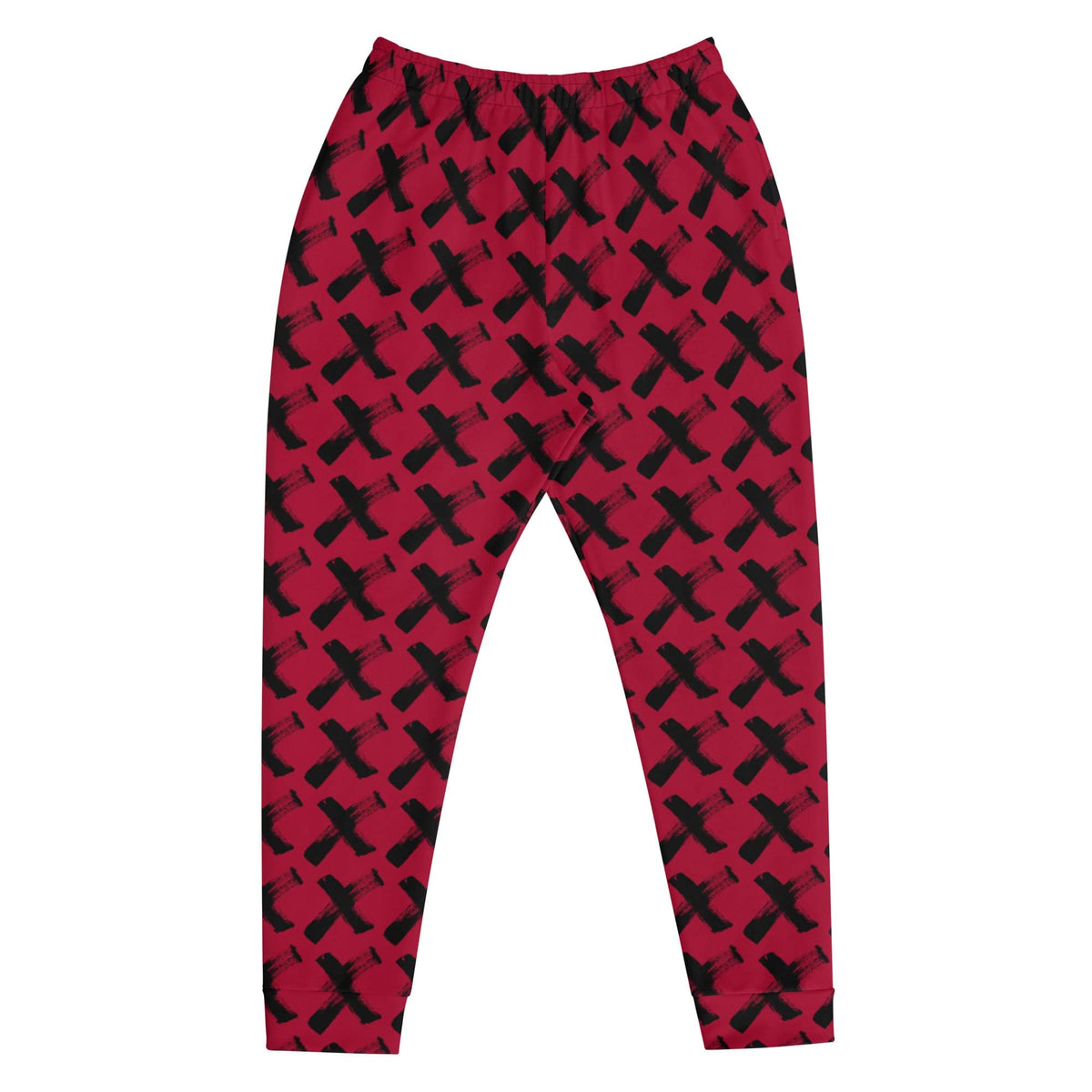 Men's red joggers with black X pattern, front view with tapered ankle cuffs
