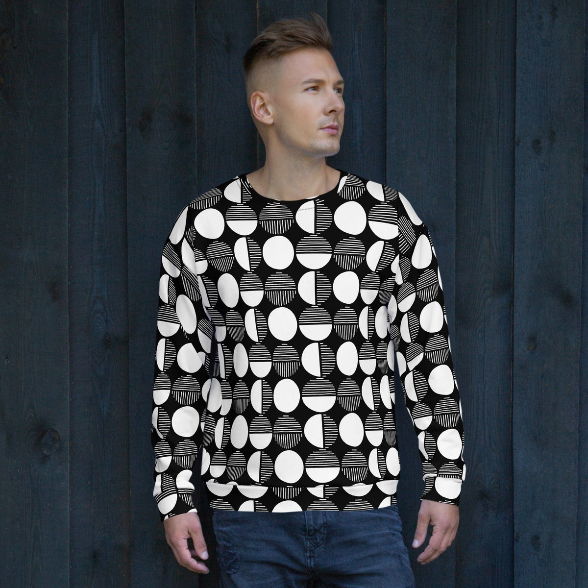 Black and white geometric print sweatshirt on model, crew neck and long sleeves.