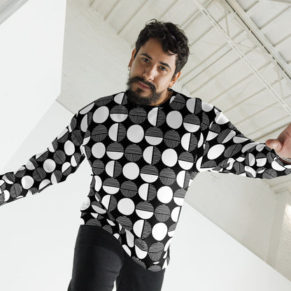Black geometric pattern sweatshirt with white circles and stripes, crew neck, long sleeves.
