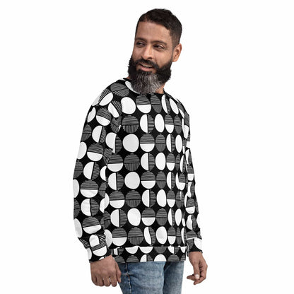 Black base geometric print sweatshirt with white circles, crew neck, long sleeves.