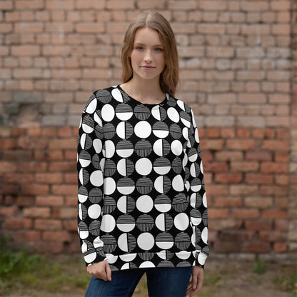 Black base geometric sweatshirt with white circle pattern, crew neck and long sleeves.