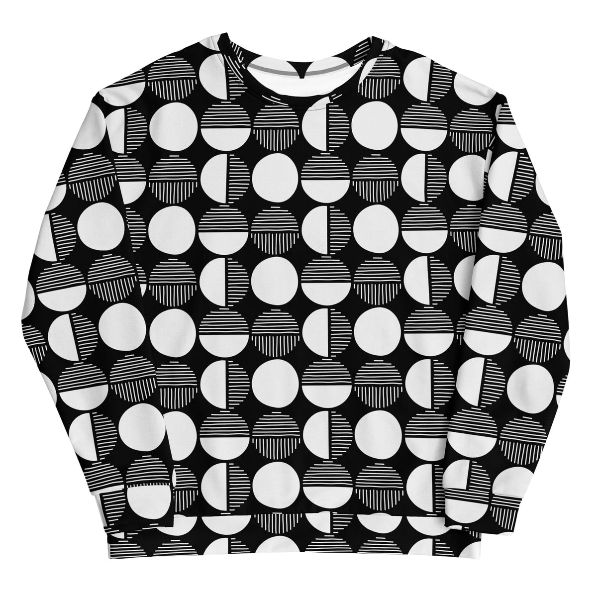 Geometric pattern sweatshirt with black base and white circles, crew neck, long sleeves.